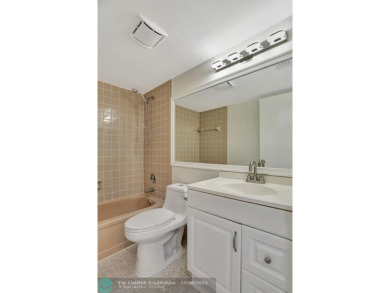 Discover this beautiful 2-bedroom, 2-bathroom gem in Palm on Oriole Golf and Tennis Club in Florida - for sale on GolfHomes.com, golf home, golf lot