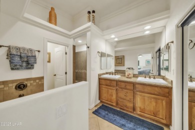 Architectural Excellence Meets Unmatched Lake Views! Welcome to on The Refuge Golf and Country Club in Arizona - for sale on GolfHomes.com, golf home, golf lot