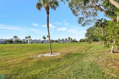 Discover this beautiful 2-bedroom, 2-bathroom gem in Palm on Oriole Golf and Tennis Club in Florida - for sale on GolfHomes.com, golf home, golf lot