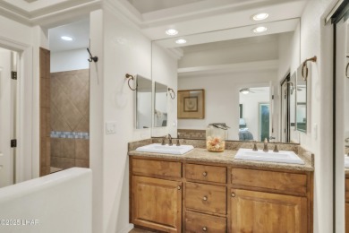 Architectural Excellence Meets Unmatched Lake Views! Welcome to on The Refuge Golf and Country Club in Arizona - for sale on GolfHomes.com, golf home, golf lot