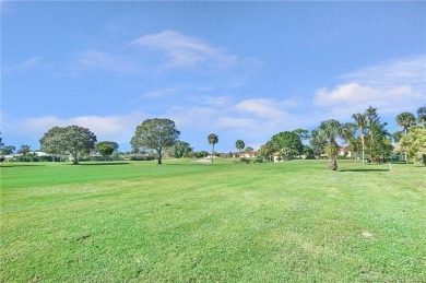 AMAZING golf views, 3/2 concrete block home in the beautiful on Miles Grant Country Club in Florida - for sale on GolfHomes.com, golf home, golf lot