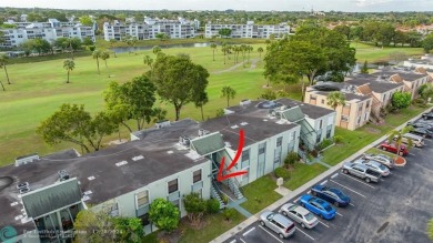 Discover this beautiful 2-bedroom, 2-bathroom gem in Palm on Oriole Golf and Tennis Club in Florida - for sale on GolfHomes.com, golf home, golf lot