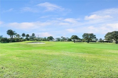 AMAZING golf views, 3/2 concrete block home in the beautiful on Miles Grant Country Club in Florida - for sale on GolfHomes.com, golf home, golf lot