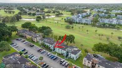 Discover this beautiful 2-bedroom, 2-bathroom gem in Palm on Oriole Golf and Tennis Club in Florida - for sale on GolfHomes.com, golf home, golf lot