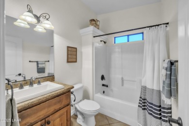 Architectural Excellence Meets Unmatched Lake Views! Welcome to on The Refuge Golf and Country Club in Arizona - for sale on GolfHomes.com, golf home, golf lot