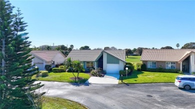 AMAZING golf views, 3/2 concrete block home in the beautiful on Miles Grant Country Club in Florida - for sale on GolfHomes.com, golf home, golf lot