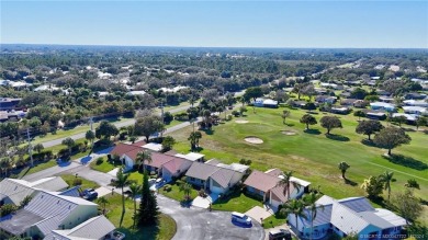 AMAZING golf views, 3/2 concrete block home in the beautiful on Miles Grant Country Club in Florida - for sale on GolfHomes.com, golf home, golf lot