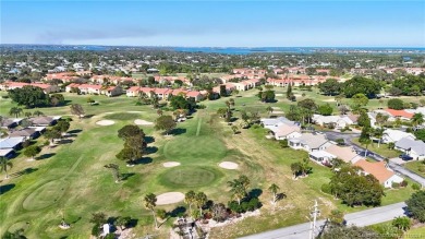 AMAZING golf views, 3/2 concrete block home in the beautiful on Miles Grant Country Club in Florida - for sale on GolfHomes.com, golf home, golf lot