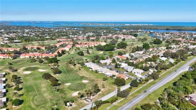 AMAZING golf views, 3/2 concrete block home in the beautiful on Miles Grant Country Club in Florida - for sale on GolfHomes.com, golf home, golf lot