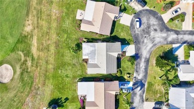 AMAZING golf views, 3/2 concrete block home in the beautiful on Miles Grant Country Club in Florida - for sale on GolfHomes.com, golf home, golf lot