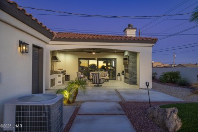 Architectural Excellence Meets Unmatched Lake Views! Welcome to on The Refuge Golf and Country Club in Arizona - for sale on GolfHomes.com, golf home, golf lot