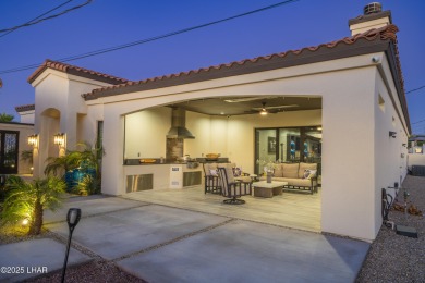 Architectural Excellence Meets Unmatched Lake Views! Welcome to on The Refuge Golf and Country Club in Arizona - for sale on GolfHomes.com, golf home, golf lot
