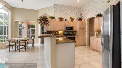 Experience the best of Florida living in this beautifully on Aberdeen Golf and Country Club in Florida - for sale on GolfHomes.com, golf home, golf lot