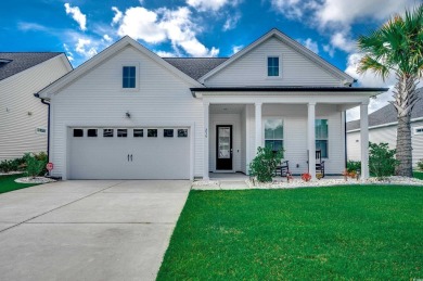 Welcome to a home that captures the relaxed elegance of coastal on International Club of Myrtle Beach in South Carolina - for sale on GolfHomes.com, golf home, golf lot