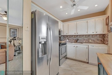 This 2 bedroom, 1.5 bath unit boasts lake and garden views in a on Southwinds Golf Course in Florida - for sale on GolfHomes.com, golf home, golf lot