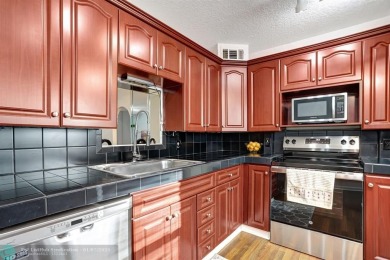 Lovely 2-Bed, 2-Bath Turnkey Home - Just Bring Your Toothbrush!
 on Wynmoor Golf Course in Florida - for sale on GolfHomes.com, golf home, golf lot