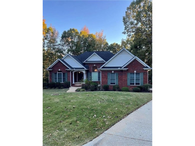 Welcome to 724 Highland Road - where elegant living meets modern on Moores Mill Golf Club in Alabama - for sale on GolfHomes.com, golf home, golf lot