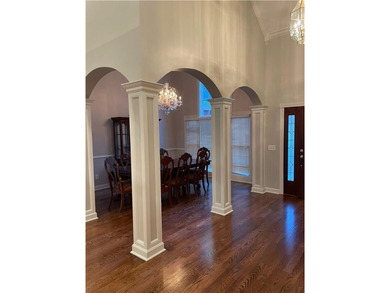 Welcome to 724 Highland Road - where elegant living meets modern on Moores Mill Golf Club in Alabama - for sale on GolfHomes.com, golf home, golf lot