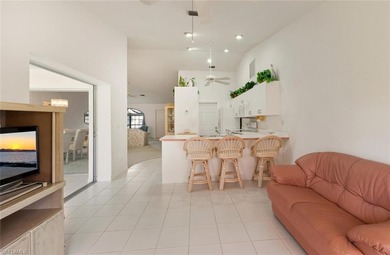 This spacious 3BR/2BA home features an oversized 26' x 13' on Riviera Golf Club in Florida - for sale on GolfHomes.com, golf home, golf lot