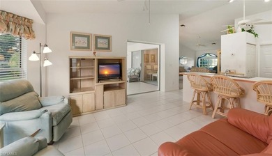 This spacious 3BR/2BA home features an oversized 26' x 13' on Riviera Golf Club in Florida - for sale on GolfHomes.com, golf home, golf lot