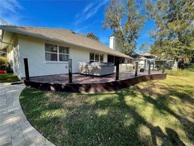 Absolutely stunning 4 bedroom, 2 bath executive home on almost 2 on Walden Lake Golf and Country Club  in Florida - for sale on GolfHomes.com, golf home, golf lot