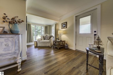 Step into the charm of Northern Michigan and a Slice of Bellaire on Shanty Creek Golf Course in Michigan - for sale on GolfHomes.com, golf home, golf lot