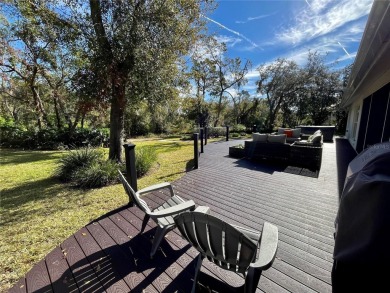 Absolutely stunning 4 bedroom, 2 bath executive home on almost 2 on Walden Lake Golf and Country Club  in Florida - for sale on GolfHomes.com, golf home, golf lot