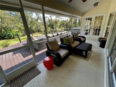 Absolutely stunning 4 bedroom, 2 bath executive home on almost 2 on Walden Lake Golf and Country Club  in Florida - for sale on GolfHomes.com, golf home, golf lot