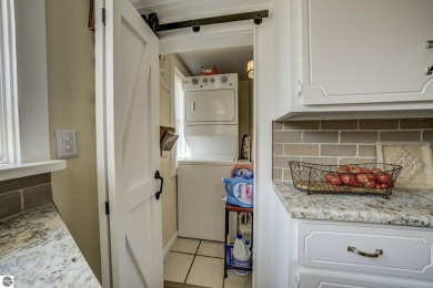 Step into the charm of Northern Michigan and a Slice of Bellaire on Shanty Creek Golf Course in Michigan - for sale on GolfHomes.com, golf home, golf lot