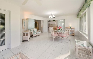 This spacious 3BR/2BA home features an oversized 26' x 13' on Riviera Golf Club in Florida - for sale on GolfHomes.com, golf home, golf lot