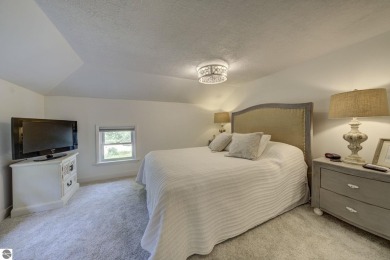 Step into the charm of Northern Michigan and a Slice of Bellaire on Shanty Creek Golf Course in Michigan - for sale on GolfHomes.com, golf home, golf lot