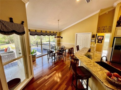 Absolutely stunning 4 bedroom, 2 bath executive home on almost 2 on Walden Lake Golf and Country Club  in Florida - for sale on GolfHomes.com, golf home, golf lot