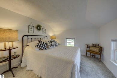 Step into the charm of Northern Michigan and a Slice of Bellaire on Shanty Creek Golf Course in Michigan - for sale on GolfHomes.com, golf home, golf lot