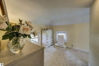 Step into the charm of Northern Michigan and a Slice of Bellaire on Shanty Creek Golf Course in Michigan - for sale on GolfHomes.com, golf home, golf lot