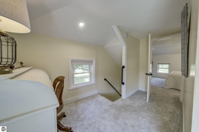 Step into the charm of Northern Michigan and a Slice of Bellaire on Shanty Creek Golf Course in Michigan - for sale on GolfHomes.com, golf home, golf lot