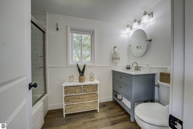 Step into the charm of Northern Michigan and a Slice of Bellaire on Shanty Creek Golf Course in Michigan - for sale on GolfHomes.com, golf home, golf lot