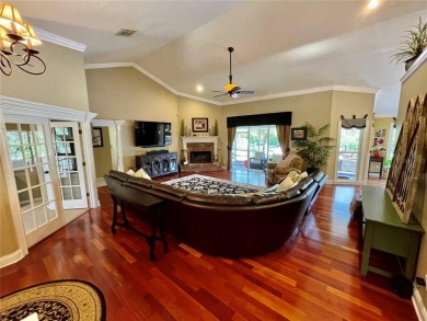 Absolutely stunning 4 bedroom, 2 bath executive home on almost 2 on Walden Lake Golf and Country Club  in Florida - for sale on GolfHomes.com, golf home, golf lot