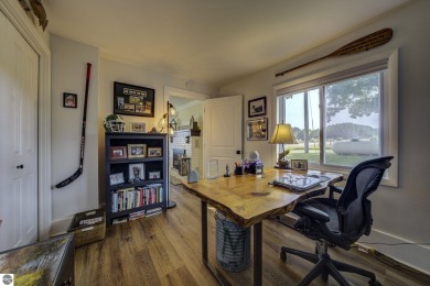 Step into the charm of Northern Michigan and a Slice of Bellaire on Shanty Creek Golf Course in Michigan - for sale on GolfHomes.com, golf home, golf lot