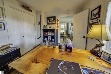 Step into the charm of Northern Michigan and a Slice of Bellaire on Shanty Creek Golf Course in Michigan - for sale on GolfHomes.com, golf home, golf lot