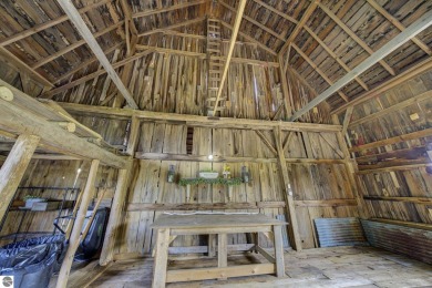 Step into the charm of Northern Michigan and a Slice of Bellaire on Shanty Creek Golf Course in Michigan - for sale on GolfHomes.com, golf home, golf lot