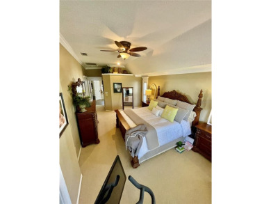 Absolutely stunning 4 bedroom, 2 bath executive home on almost 2 on Walden Lake Golf and Country Club  in Florida - for sale on GolfHomes.com, golf home, golf lot