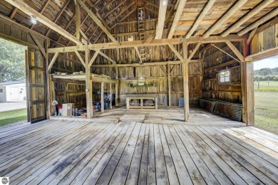 Step into the charm of Northern Michigan and a Slice of Bellaire on Shanty Creek Golf Course in Michigan - for sale on GolfHomes.com, golf home, golf lot