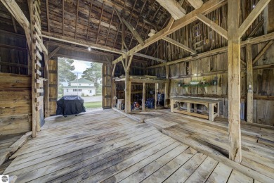 Step into the charm of Northern Michigan and a Slice of Bellaire on Shanty Creek Golf Course in Michigan - for sale on GolfHomes.com, golf home, golf lot