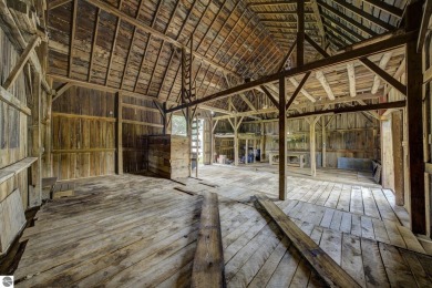 Step into the charm of Northern Michigan and a Slice of Bellaire on Shanty Creek Golf Course in Michigan - for sale on GolfHomes.com, golf home, golf lot