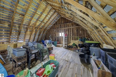 Step into the charm of Northern Michigan and a Slice of Bellaire on Shanty Creek Golf Course in Michigan - for sale on GolfHomes.com, golf home, golf lot