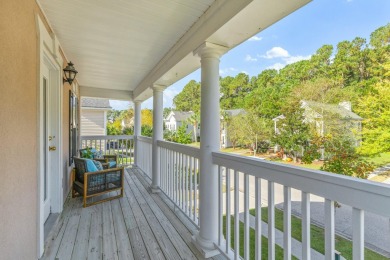 Welcome to this charming Charleston-style home, showcasing on Charleston National Golf Club in South Carolina - for sale on GolfHomes.com, golf home, golf lot