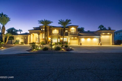 Welcome to 2325 Demaret Drive, an iconic and timeless estate on London Bridge Golf Course in Arizona - for sale on GolfHomes.com, golf home, golf lot