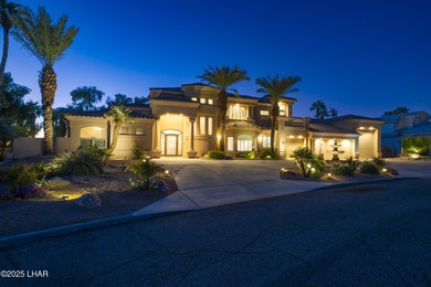 Welcome to 2325 Demaret Drive, an iconic and timeless estate on London Bridge Golf Course in Arizona - for sale on GolfHomes.com, golf home, golf lot
