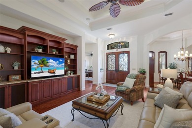 Set on nearly a half acre at the end of a quiet cul-de-sac with on Ritz-Carlton Members Golf Club in Florida - for sale on GolfHomes.com, golf home, golf lot