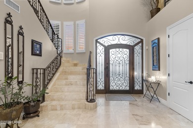 Welcome to 2325 Demaret Drive, an iconic and timeless estate on London Bridge Golf Course in Arizona - for sale on GolfHomes.com, golf home, golf lot